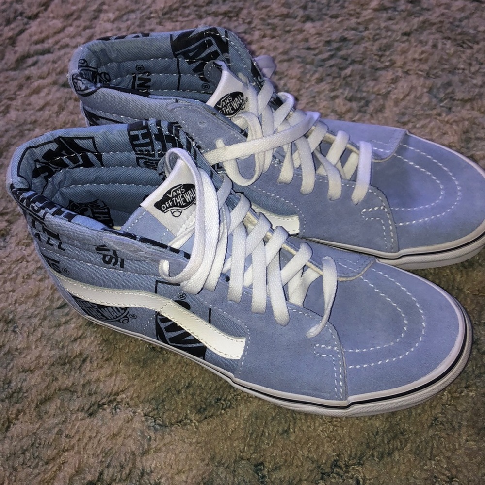 Blue high top Vans sneakers